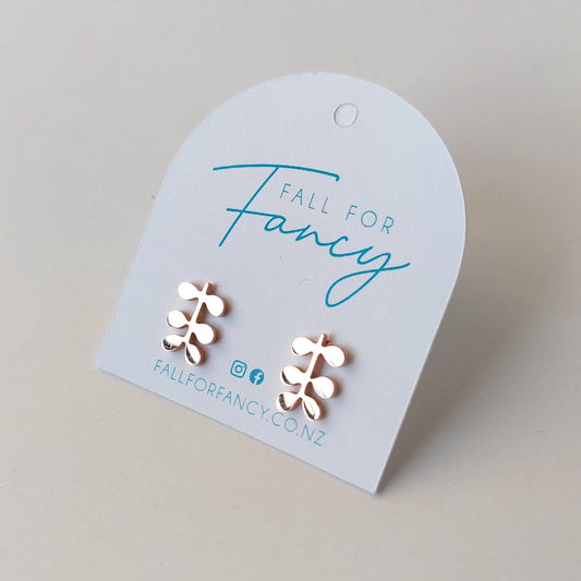 Small rose gold stainless steel studs each earring has 6 small leaves off a main stem